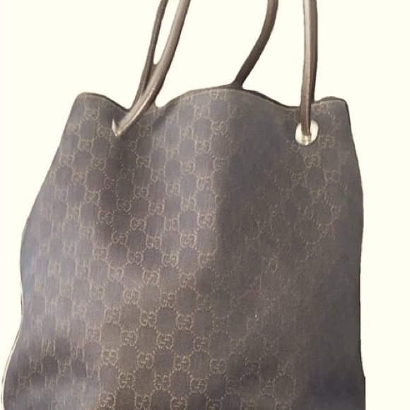 Gucci canvas tote in good condition; minor signs of wear at base corner. - Picture 2 of 4